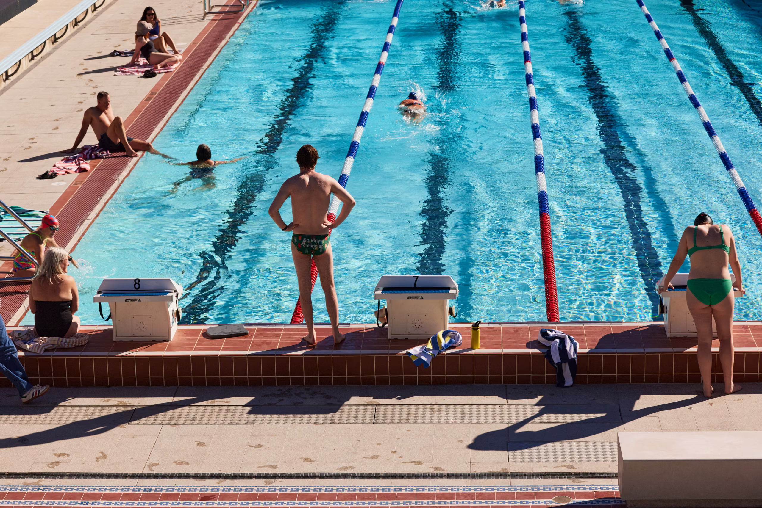 Swimmers in the 50-metre outdoor pool