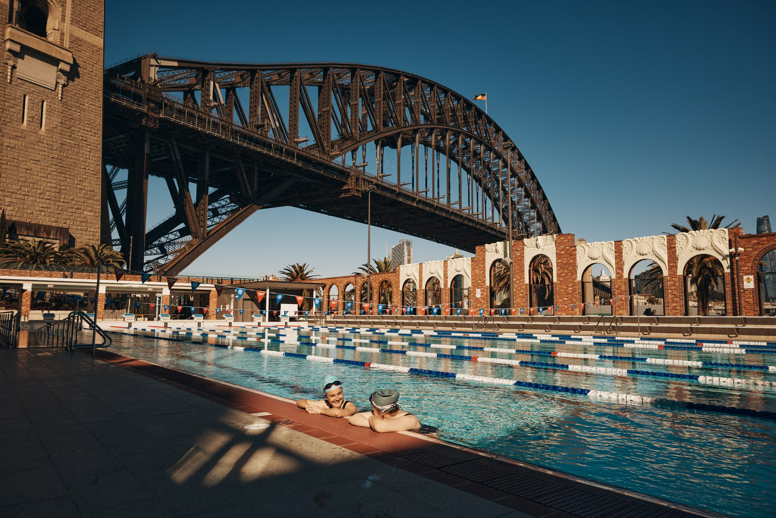 The 50 metre outdoor pool with the Harbour Bridge and city skyline behind