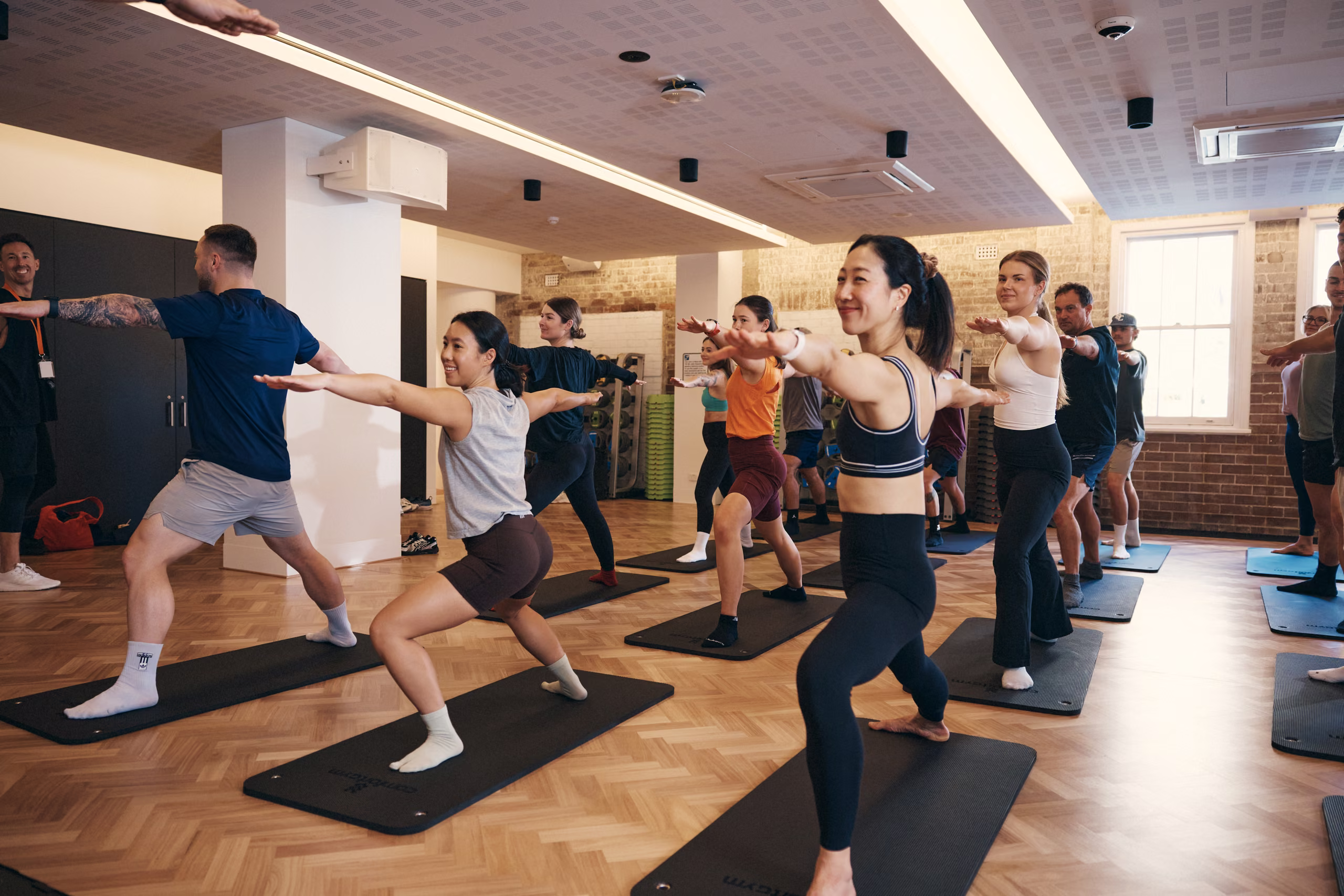 A group fitness class training together in the studio