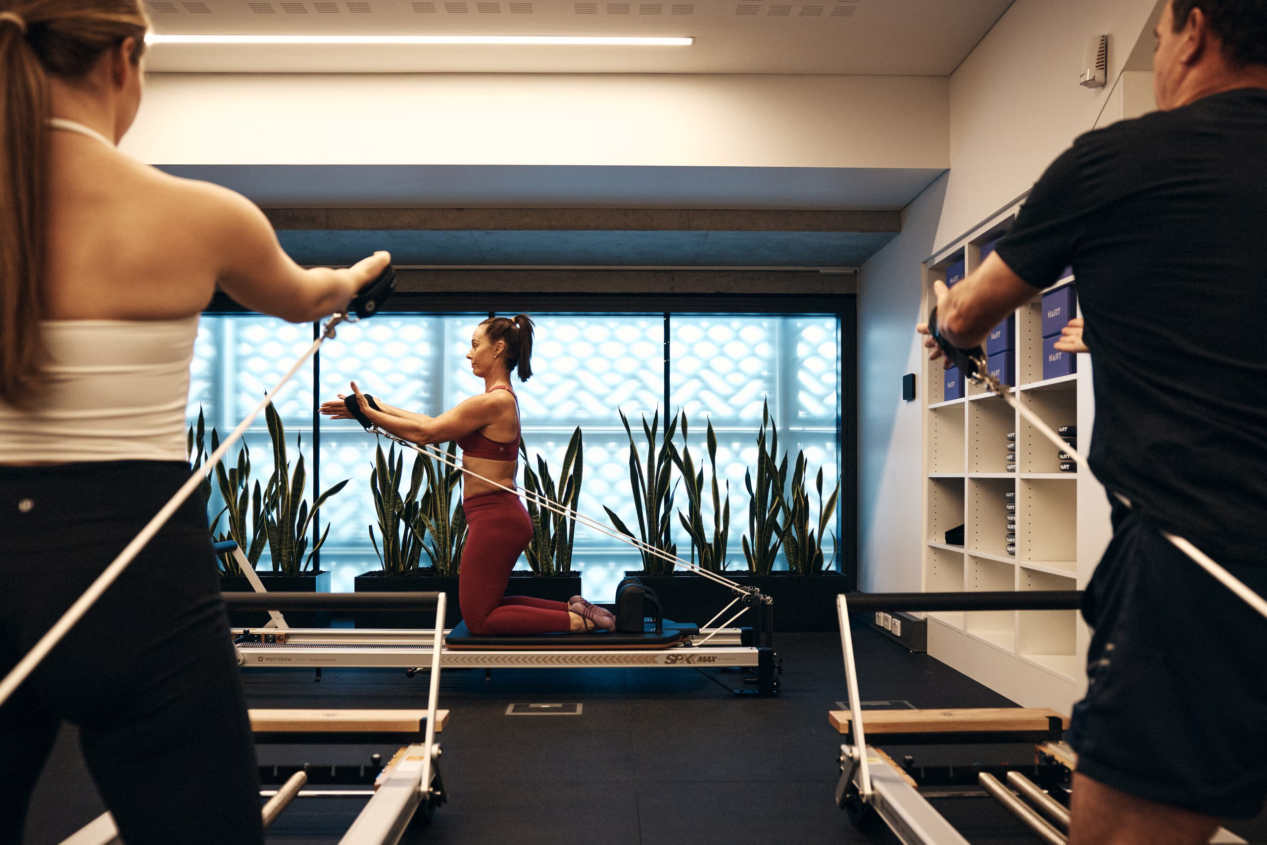 A group class stretching in the studio