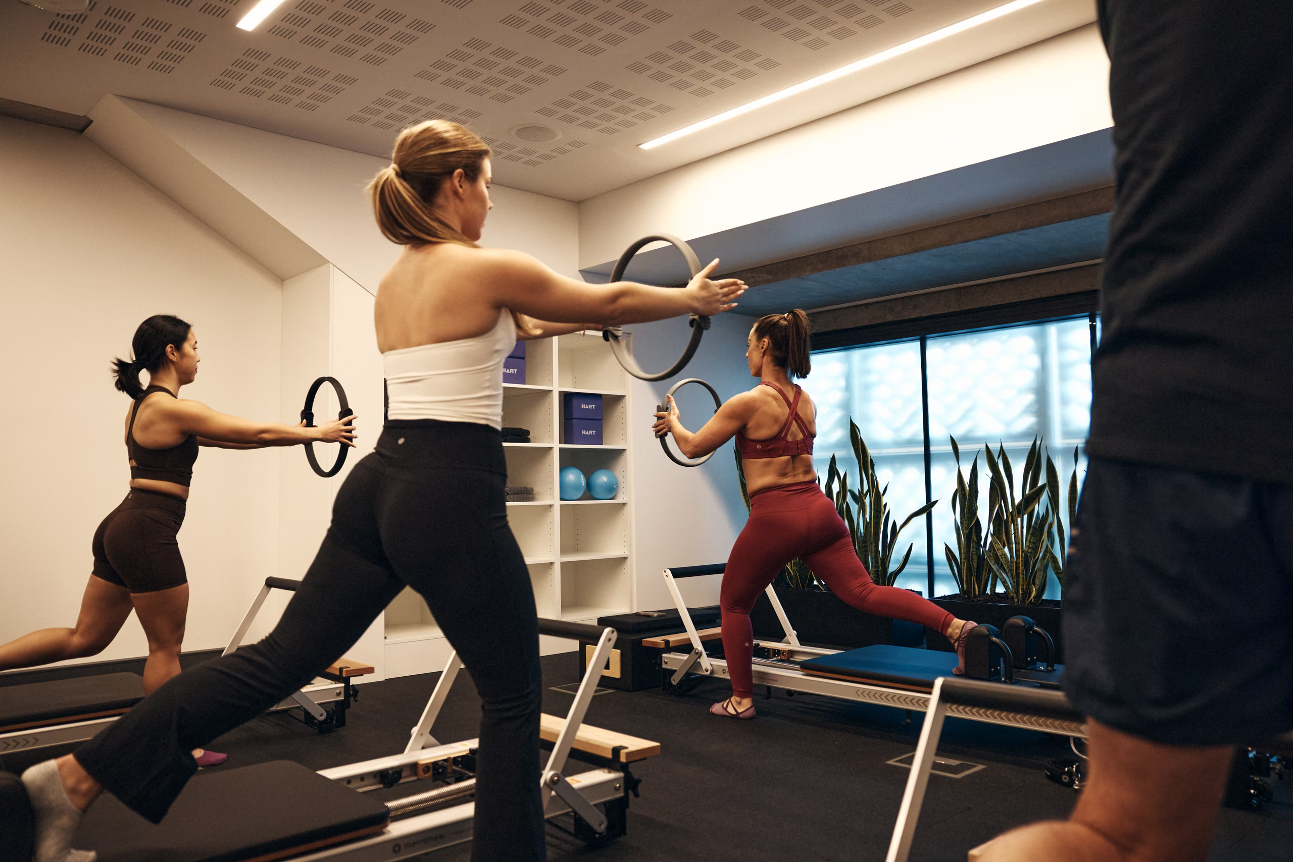 A reformer Pilates class in the boutique studio