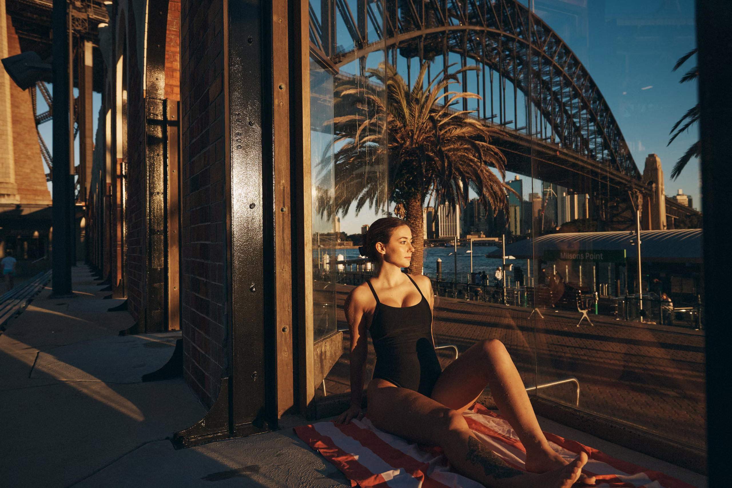 A swimmer relaxing at the edge of North Sydney Olympic Pool